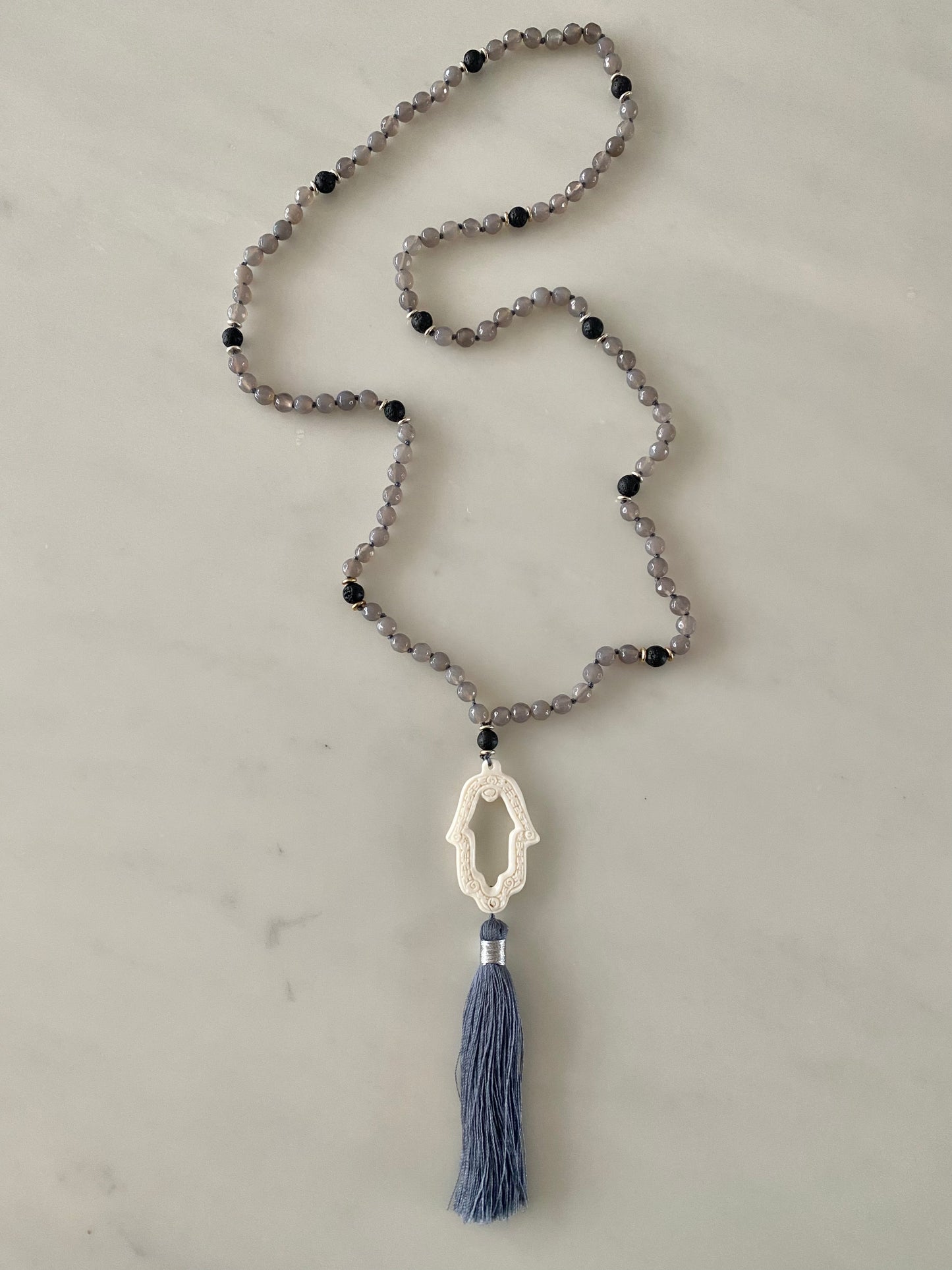 GREY AGATE VOLCANIC PRAYER HAND NECKLACE