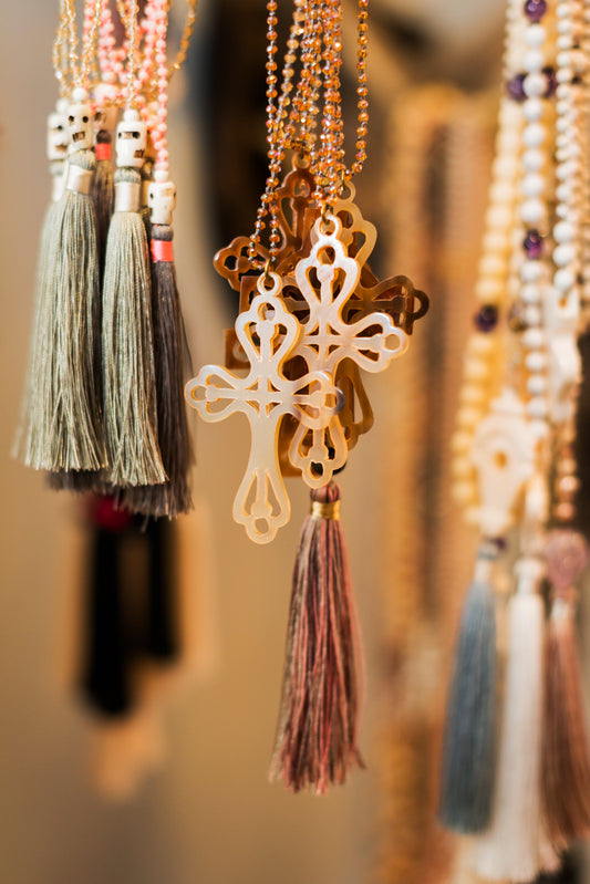 AMBER AMULET HORN CROSS WITH TASSEL