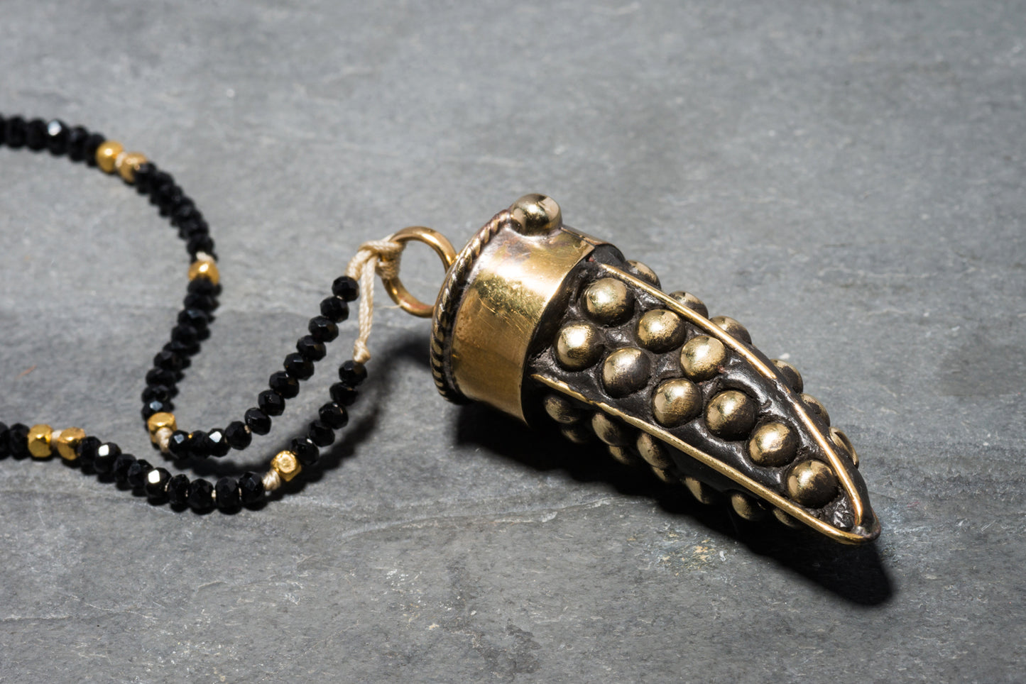 STUDDED ROCK TUSK PENDANT