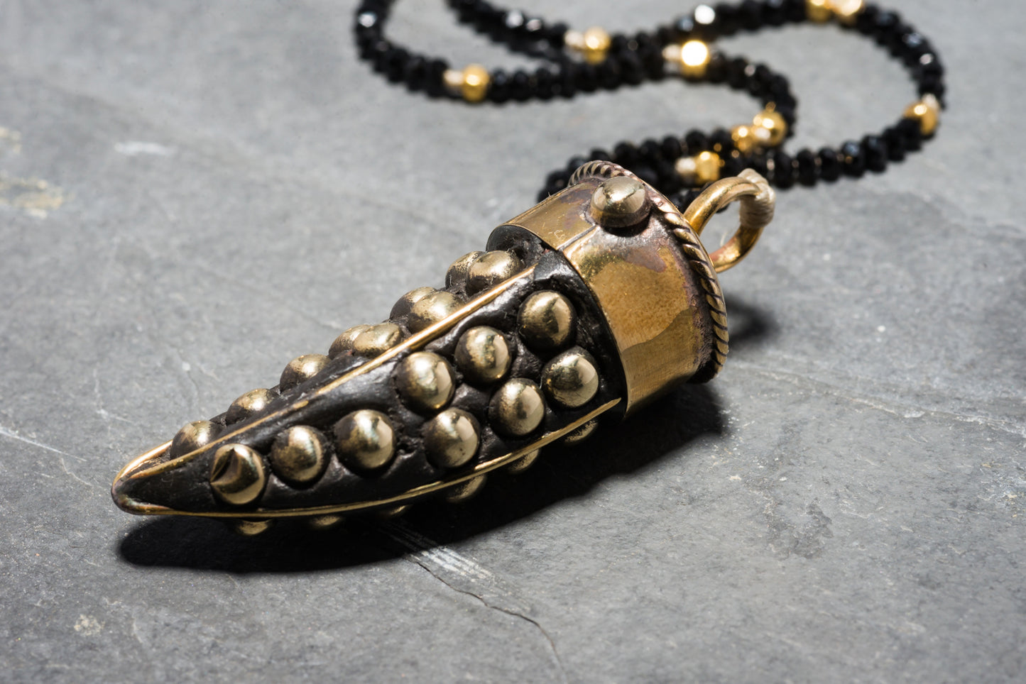 STUDDED ROCK TUSK PENDANT