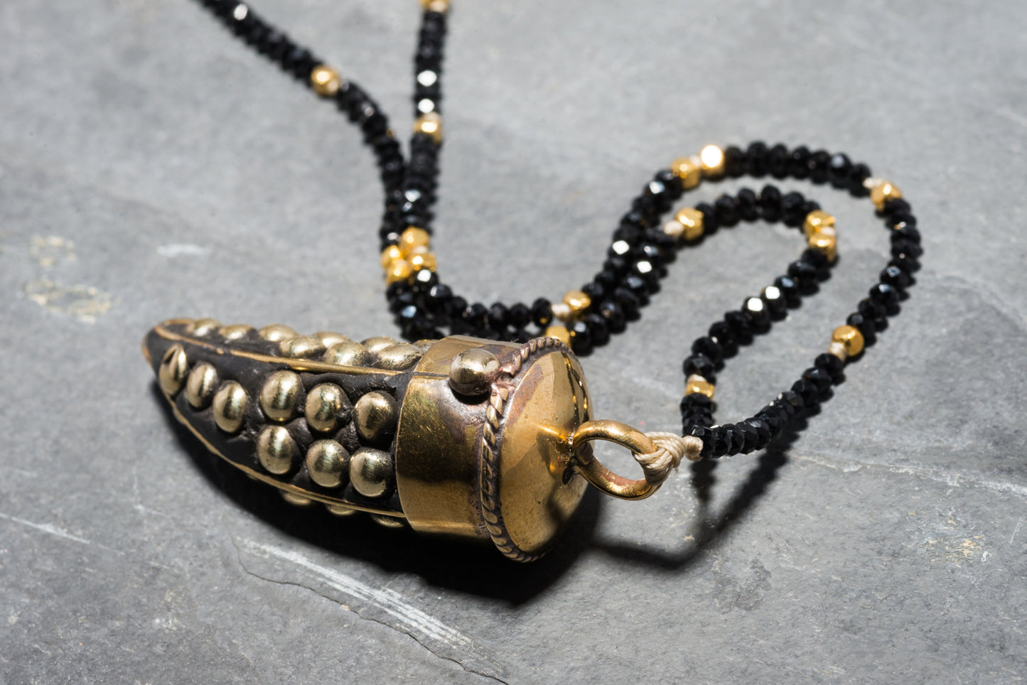 STUDDED ROCK TUSK PENDANT