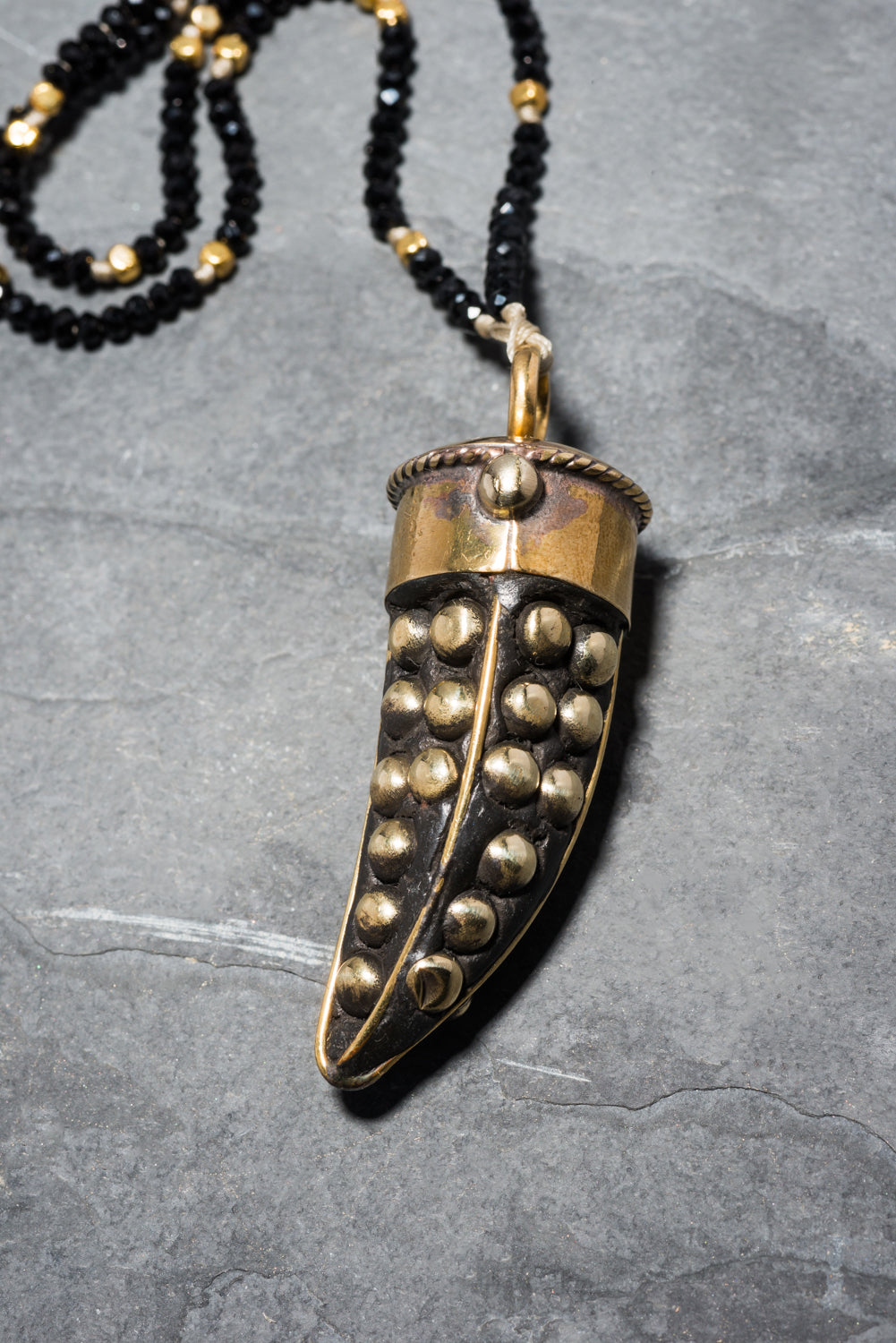 STUDDED ROCK TUSK PENDANT
