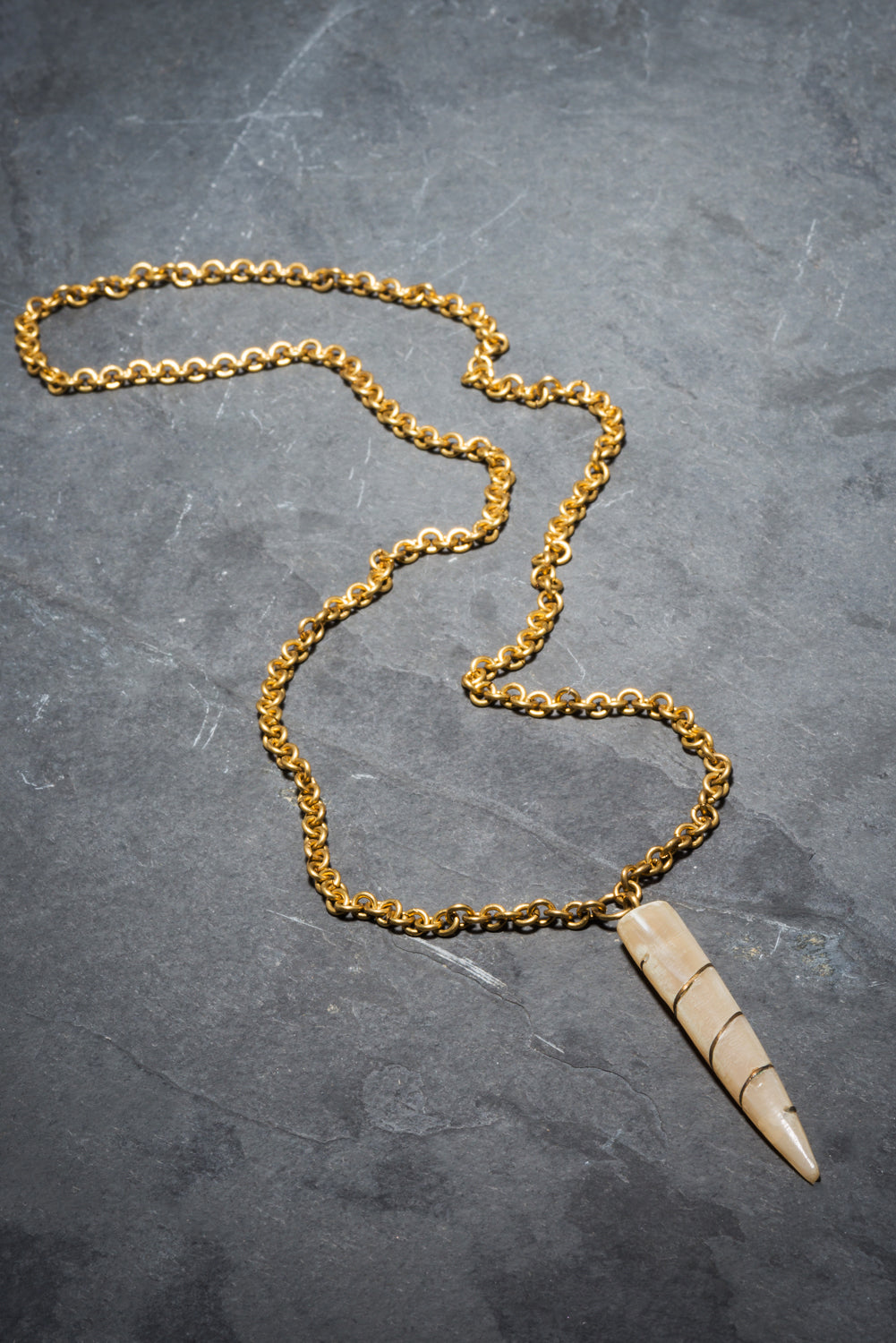 OND TUSK BRASS PENDANT