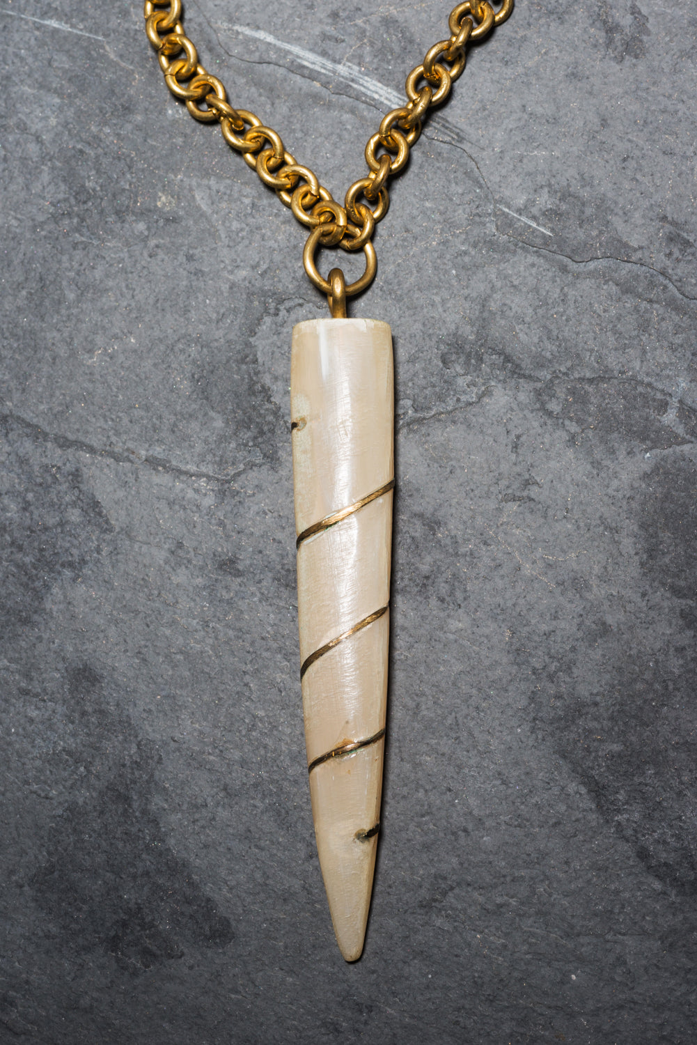 OND TUSK BRASS PENDANT