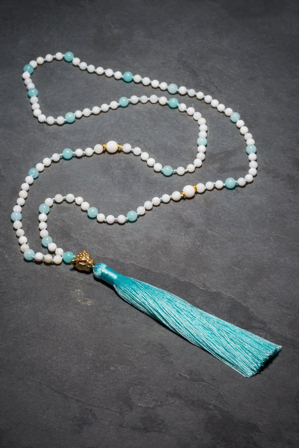 AQUA ISLAND BEACH LEO TASSEL