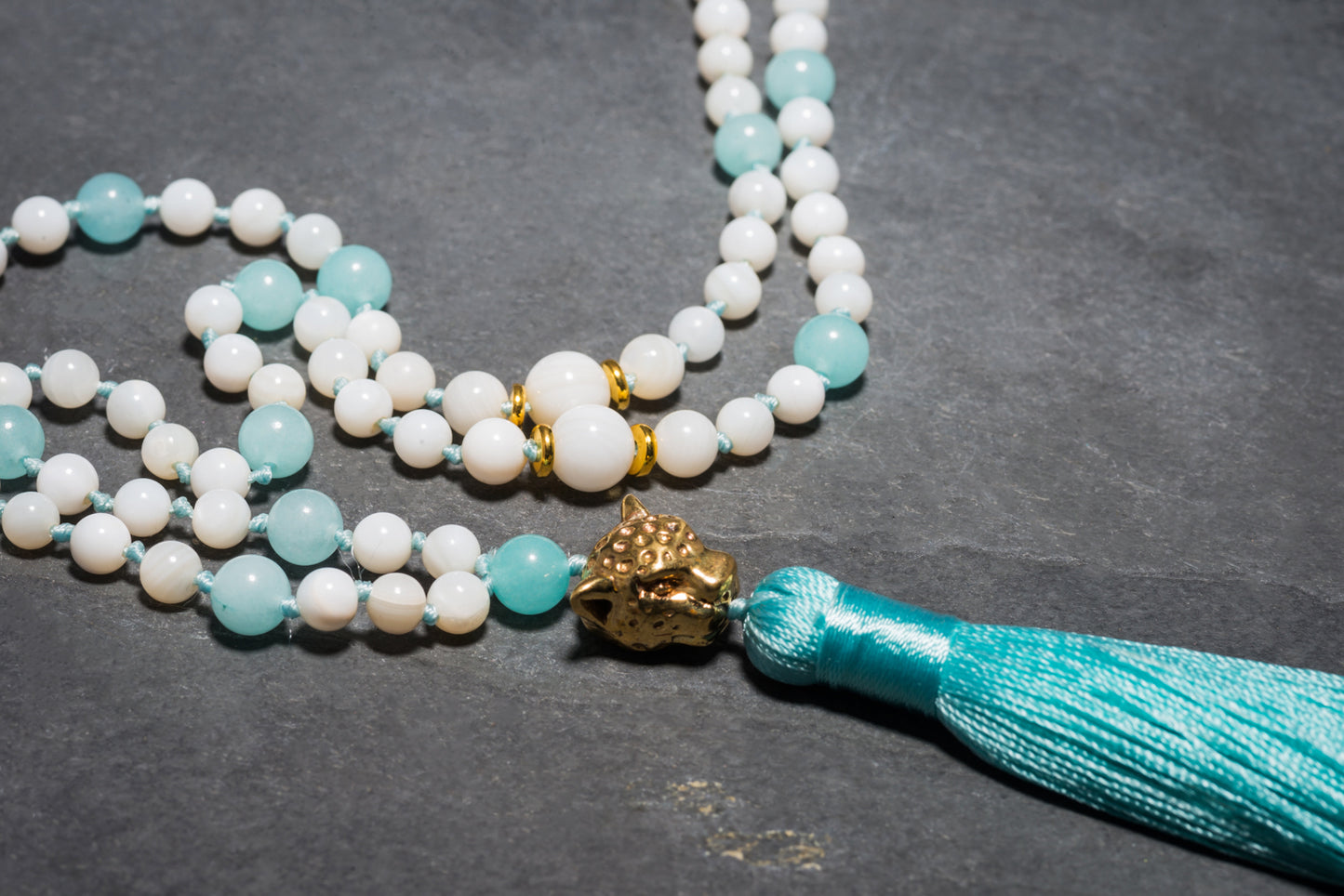 AQUA ISLAND BEACH LEO TASSEL