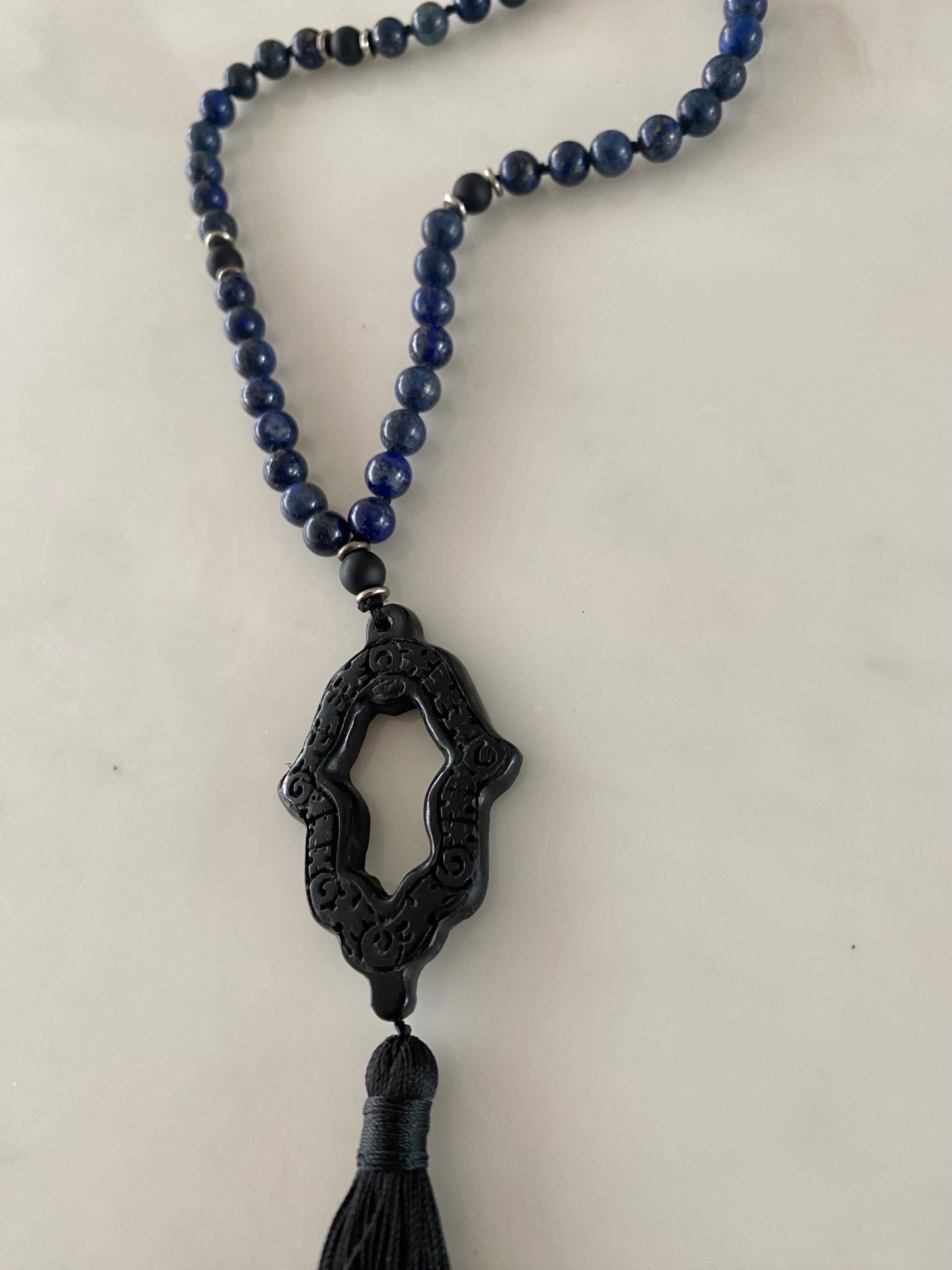 LAPIS LAZULI + BLACK ONYX PRAYER HAND NECKLACE