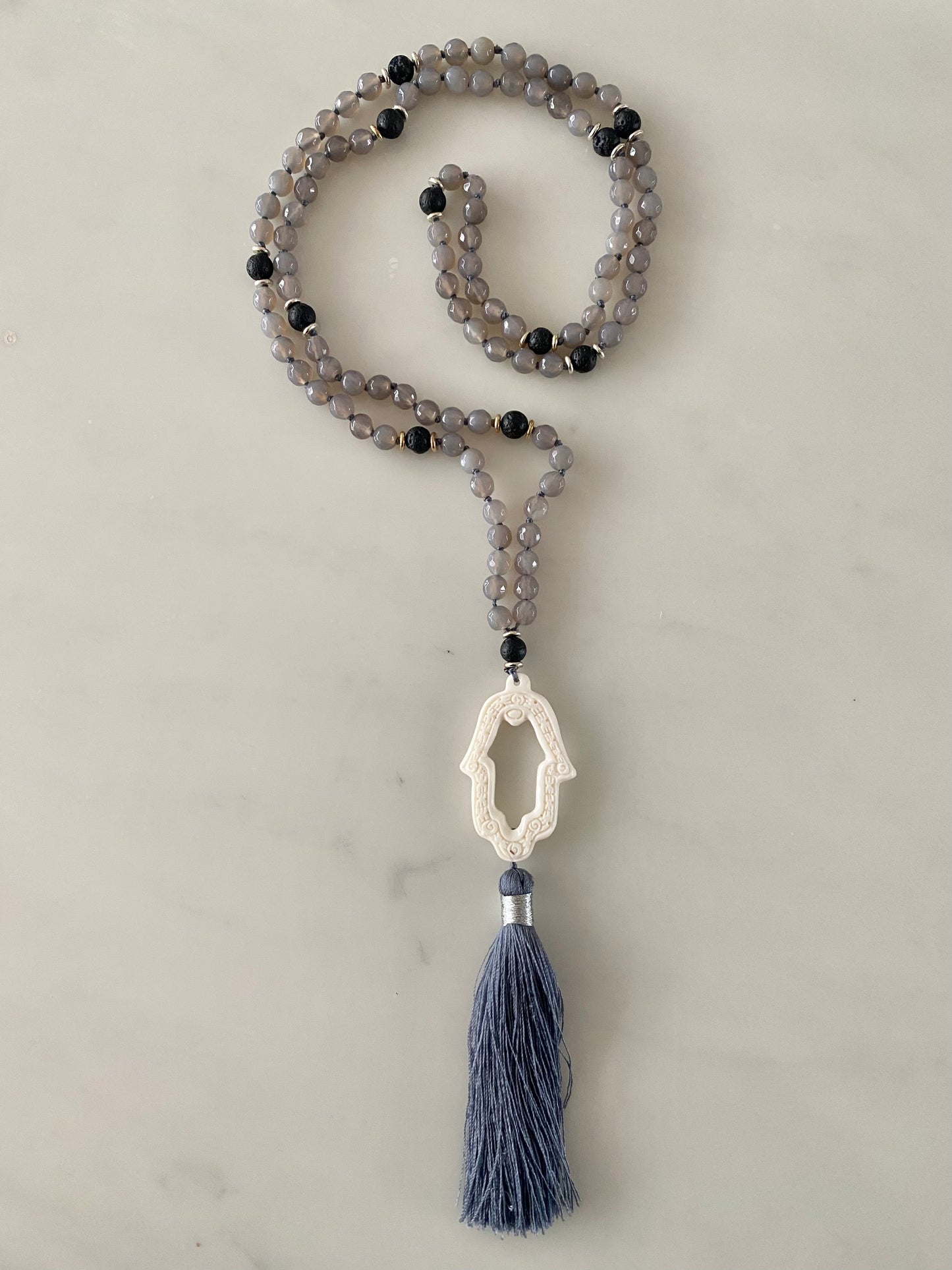 GREY AGATE VOLCANIC PRAYER HAND NECKLACE