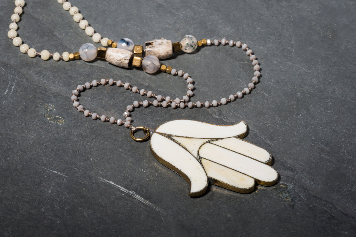 LIGHTNESS PRAYER HAND NECKLACE