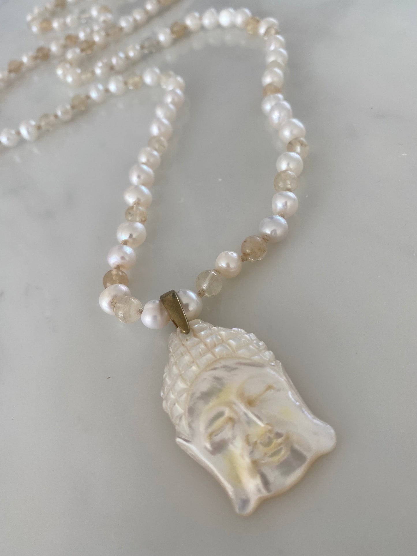 MOTHER OF PEARL BUDDHA NECKLACE
