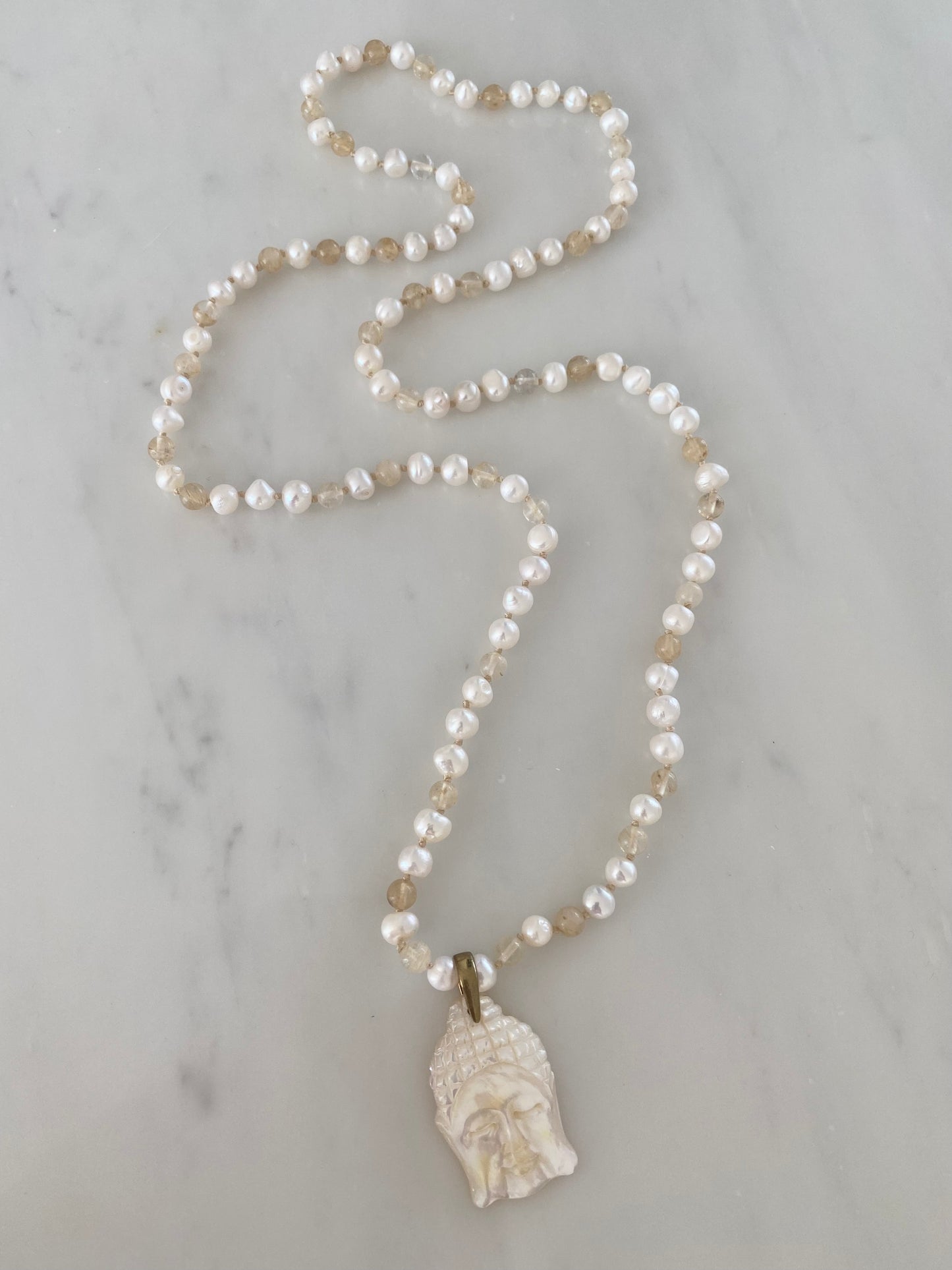 MOTHER OF PEARL BUDDHA NECKLACE