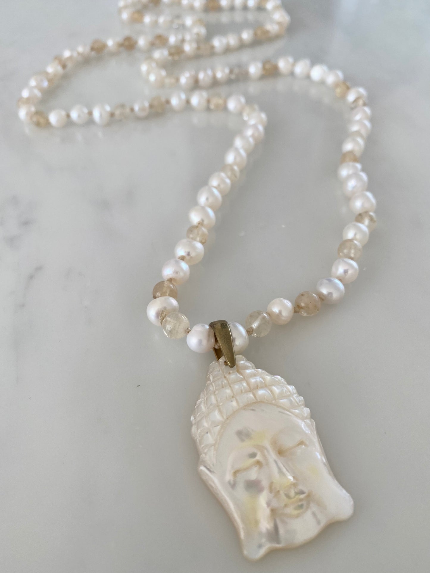 MOTHER OF PEARL BUDDHA NECKLACE